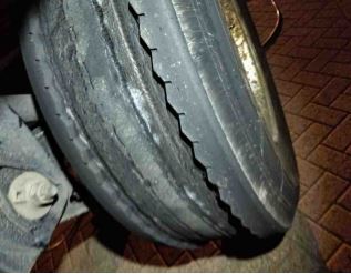 catastrophic loss of tread was caused by a blowout